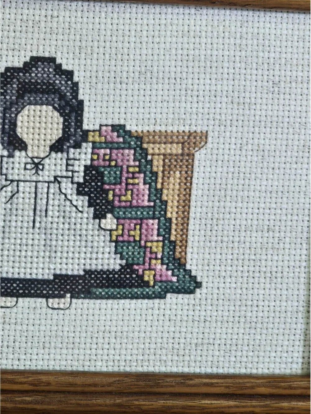 Country Cross stitch framed 9.5x7.5 has some discolorations.
